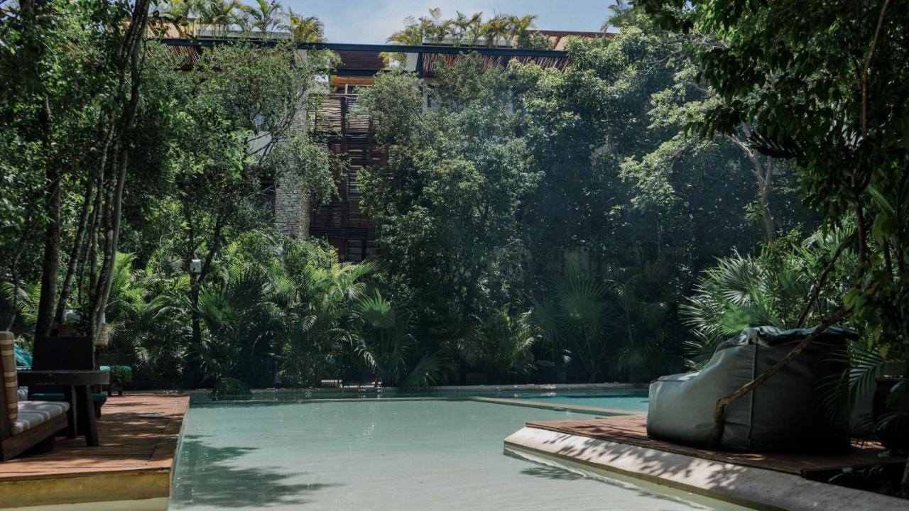 Copal Tulum Hotel Bagian luar foto The swimming pool at the hotel