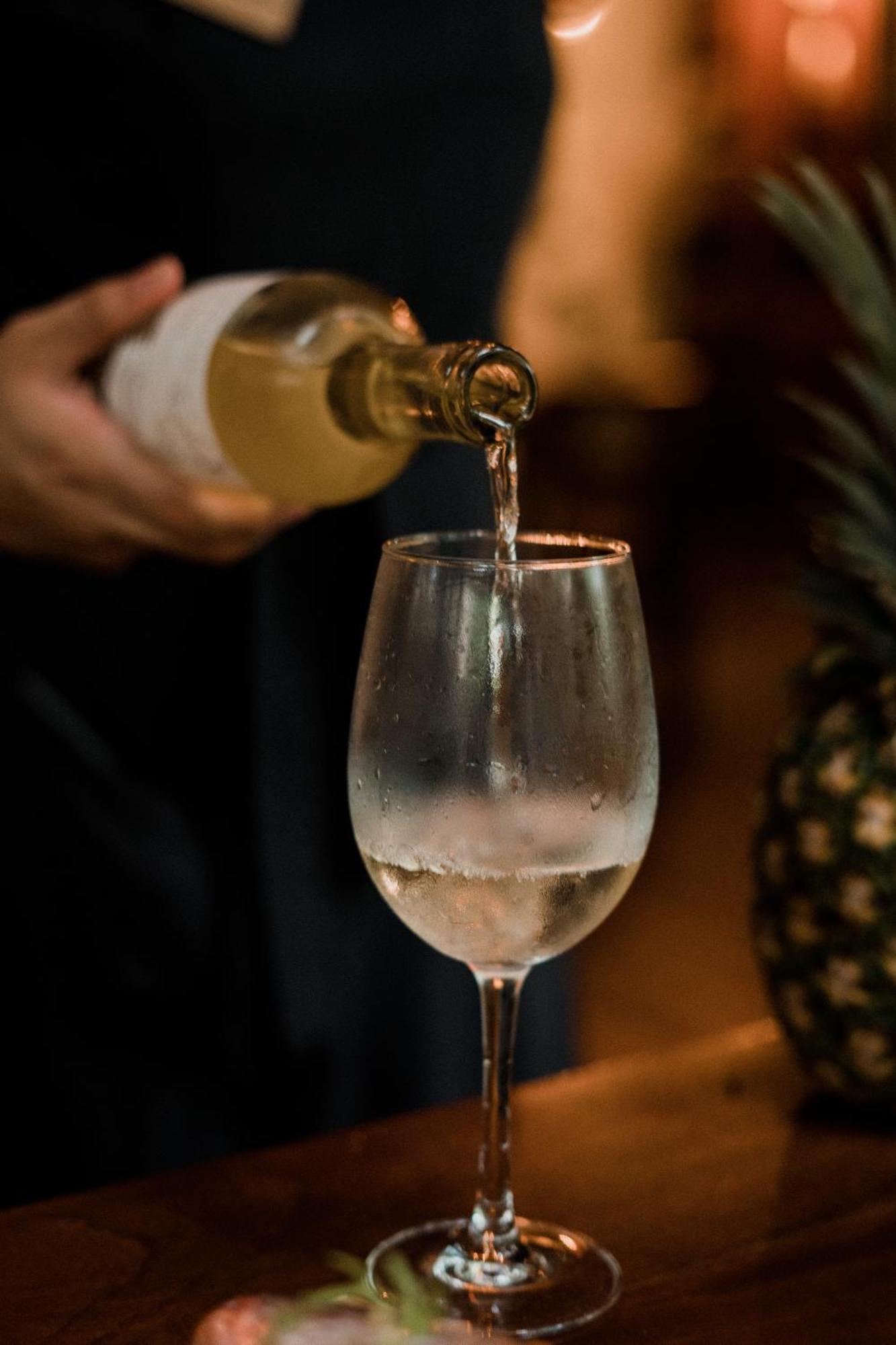 Copal Tulum Hotel Bagian luar foto A glass of sparkling wine